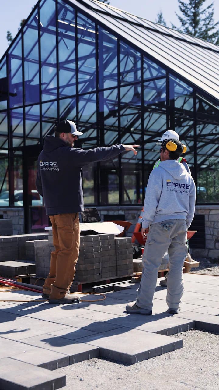 Tyler Rusch, owner of Empire Landscaping leaning on a chair