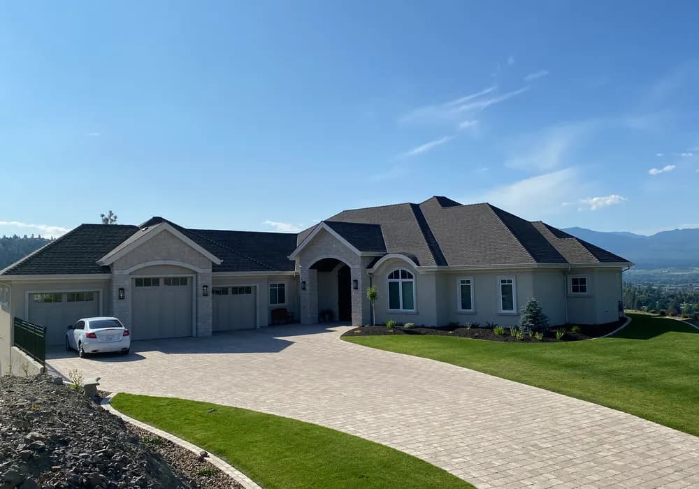 drive way and mountain top view modern home