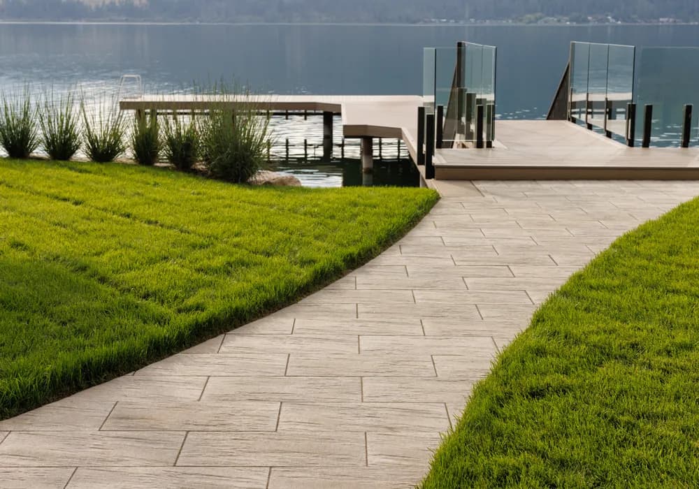 green grass and lakefront property