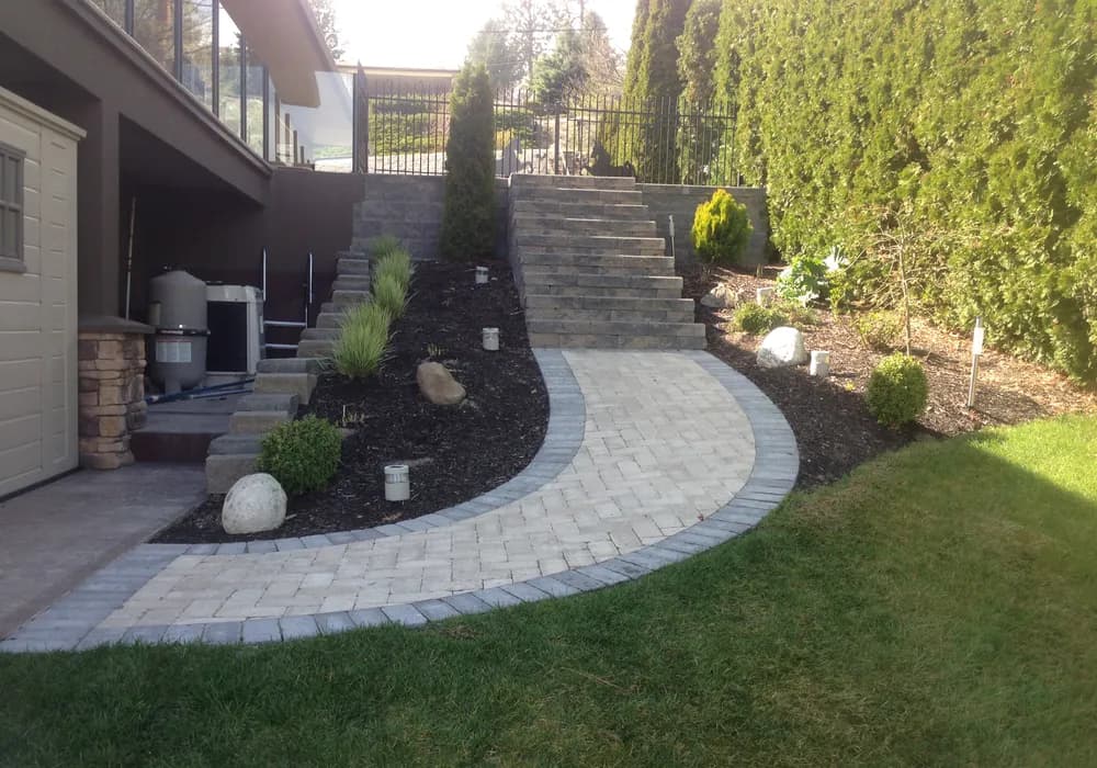 stairs and mulch with paver stone walkway
