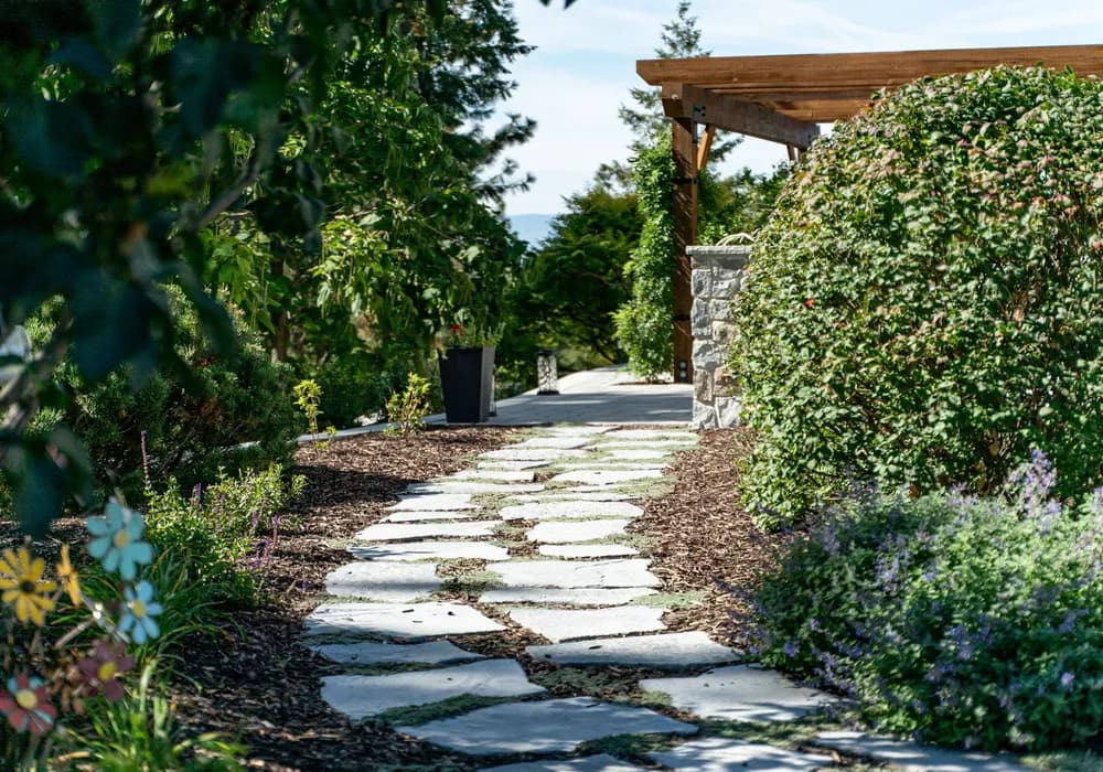 walkway paver stones and shrubs and flowers