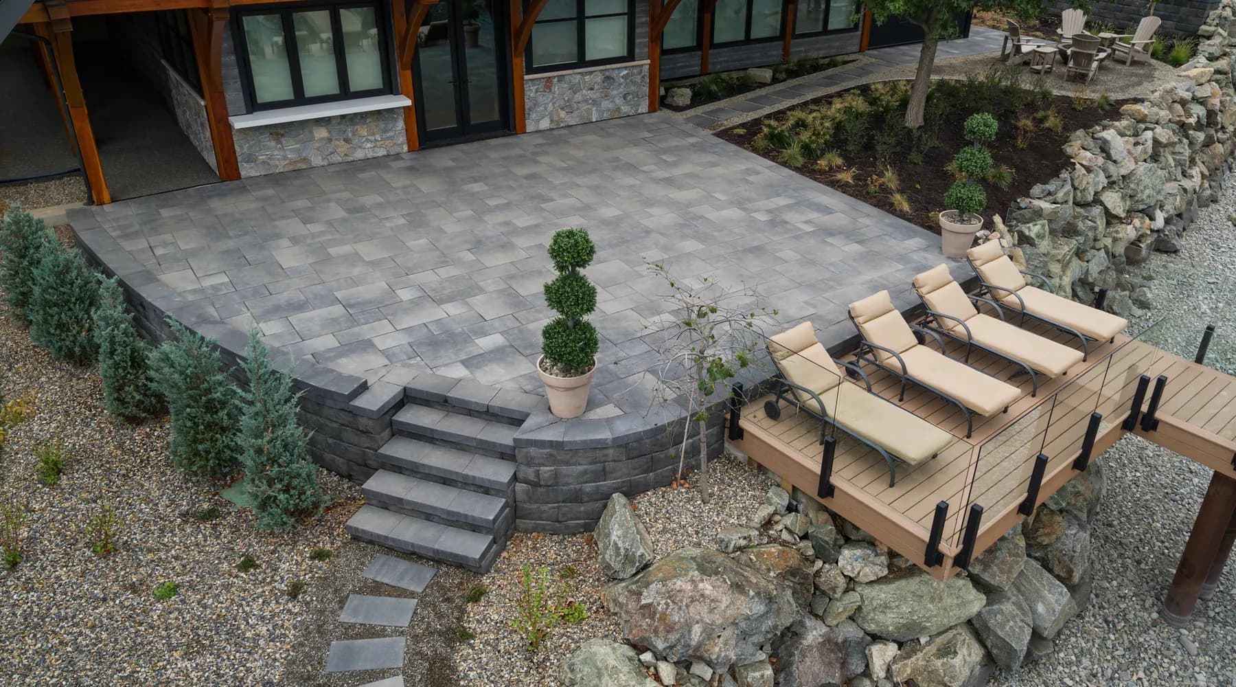 lakefront property with walkway retaining wall and stairs