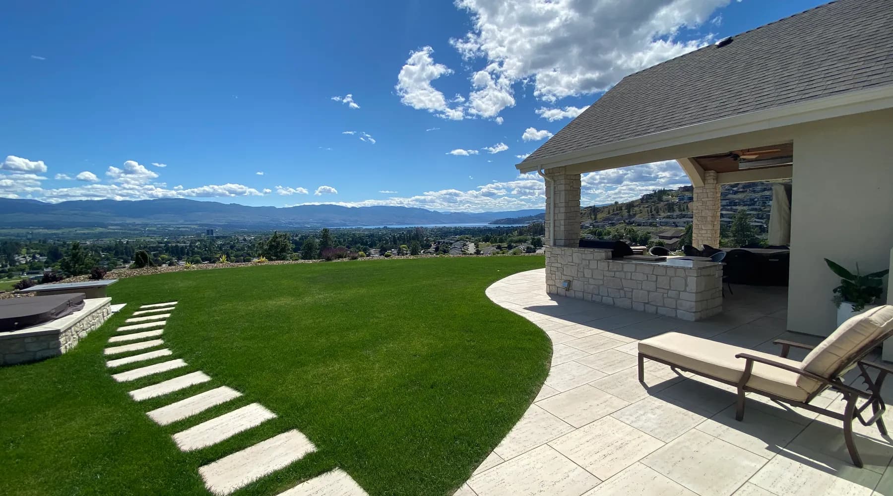 paver stone flooring with a walkway and a view