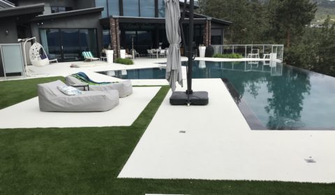 landscaped backyard with turf installation